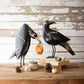 Set of 2 Recycled Iron Crows Holding a Pumpkin