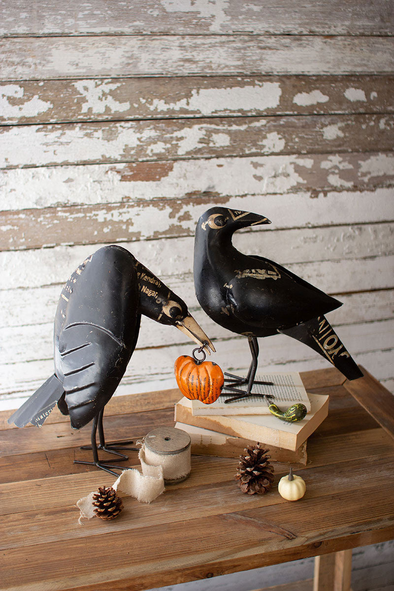 Set of 2 Recycled Iron Crows Holding a Pumpkin