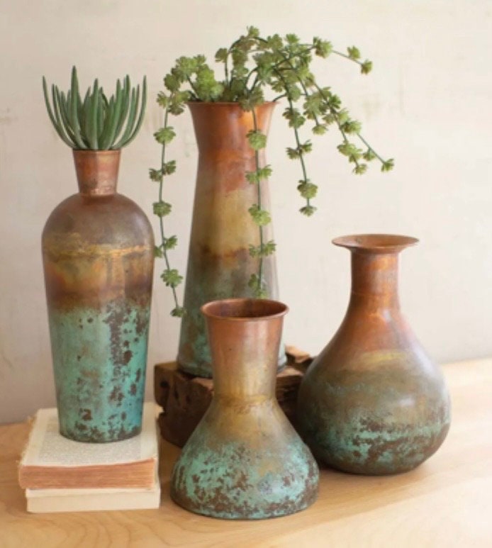 Set of Four Copper Vases