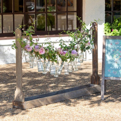 Wooden Stanchion with Bottle Garland Vases
